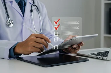 doctor entering an ECCF on a tablet