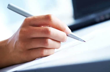 hand writing with a pen