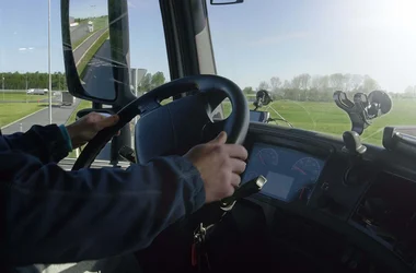 Truck Driver with hands on the wheel