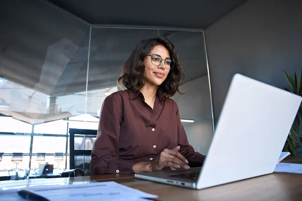 young professional working on laptop