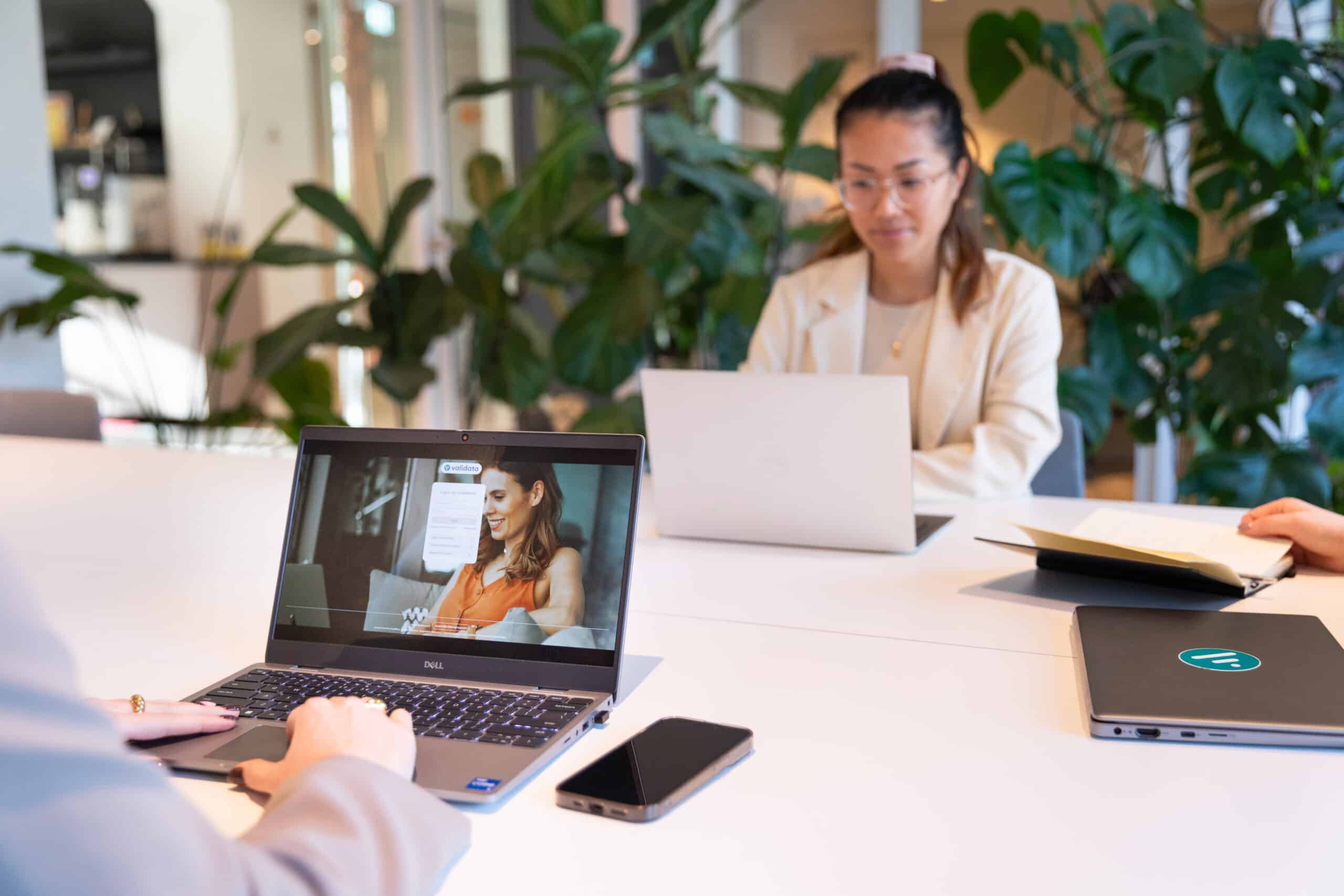 two employees working in office