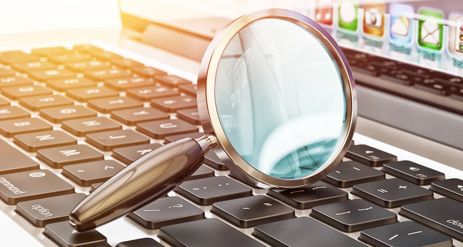 Magnifying glass on a keyboard