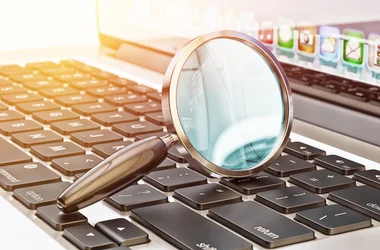 Magnifying glass on keyboard