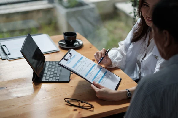 woman filling out a pre-employment form