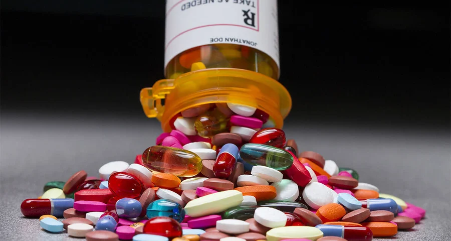 prescription drug bottle pills spilling