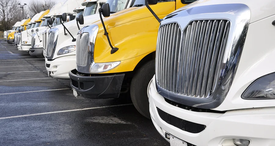 Truck fleet parked in a lot ready for an entry-level driver